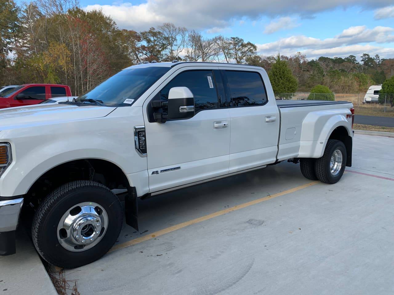 White Ford F-350 dually with tinted windows